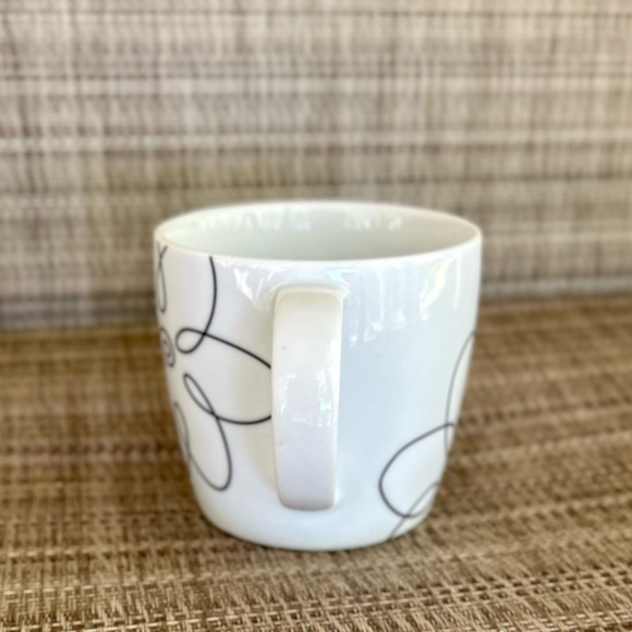 Crate & Barrel Daisy Doodle Coffee Cup designed by Judith Mossekruger - Picture 2 of 7